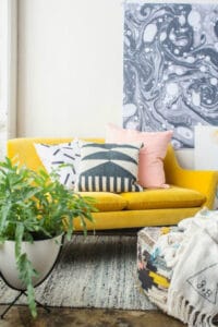 yellow color adds a bright dimension to this room