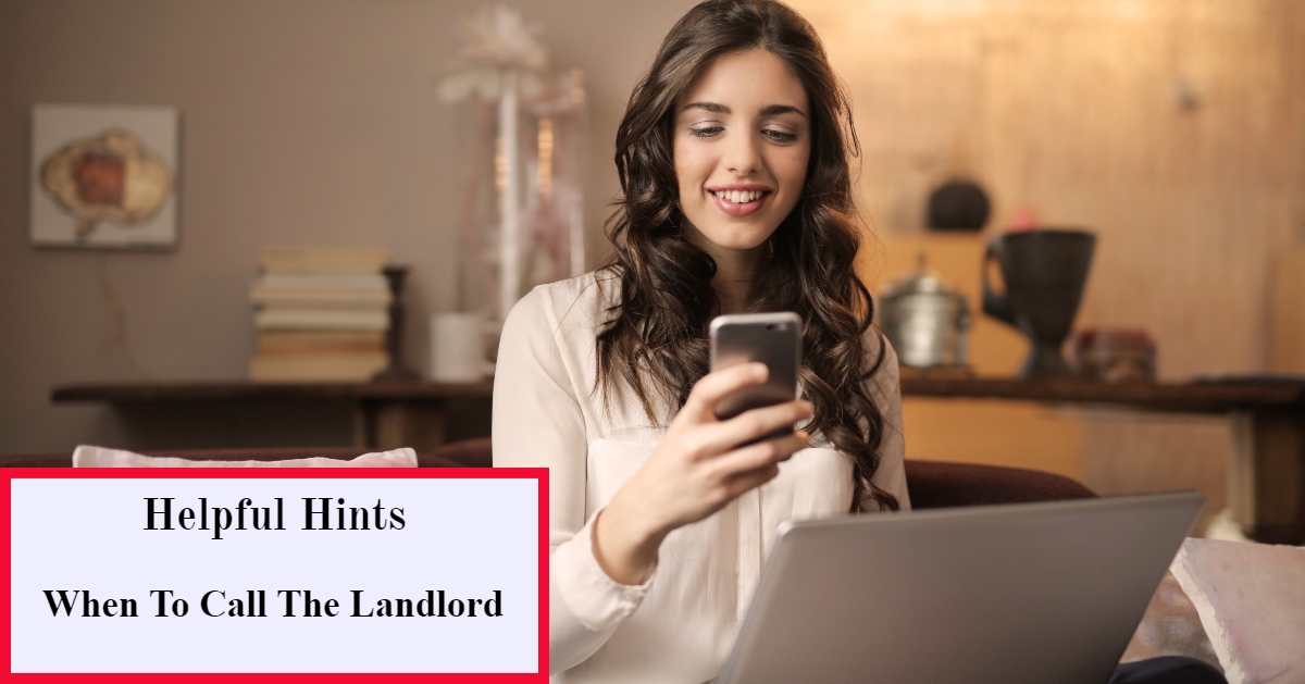 Smiling Woman Looking at Phone with a Laptop knowing when to call the landlord